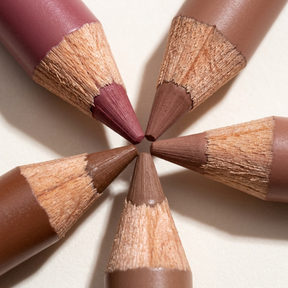 Close-up of sharpened lip pencil tips.