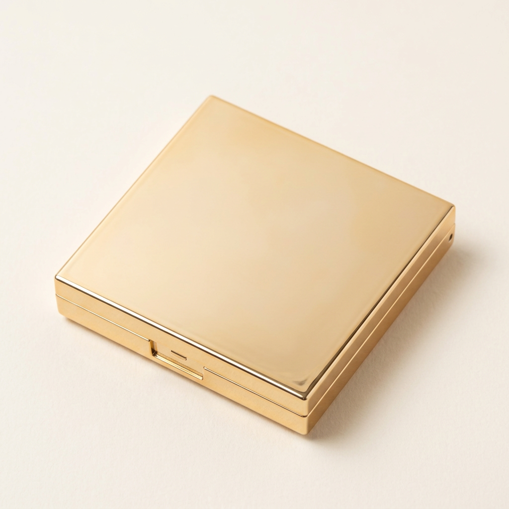 Illustrative fully closed gold-tone square compact neatly displayed.